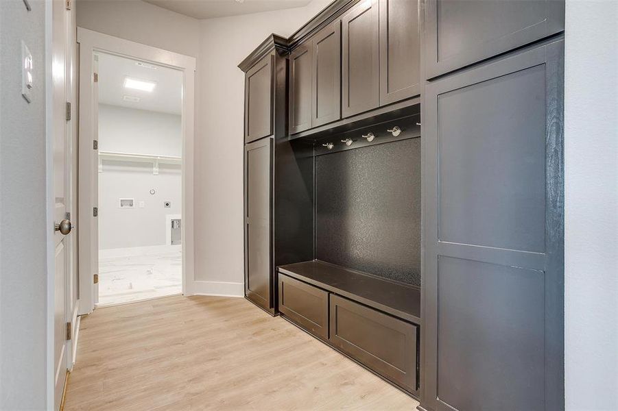 Mudroom featuring light hardwood / wood-style floors