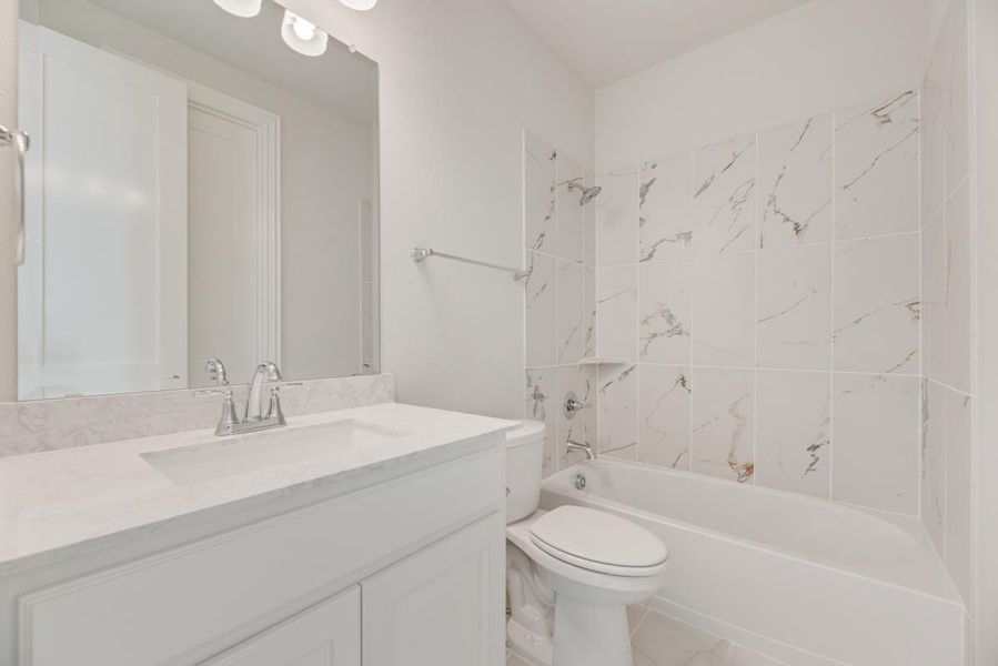 Representative furnished interior of a home built from the Royal Martinique by Grand Homes in Prairie Ridge, Venus (Image 10). Representative furnished interior of a home built from the Royal Martinique by Grand Homes in Prairie Ridge, Venus (Image 10).