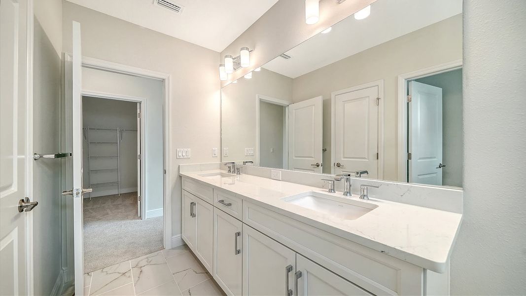 Furnished interior view inside a new home in Palm Grove Real Estate and Homes for Sale in Lakewood Ranch, FL - Neal Communities, Bradenton (Image 4).