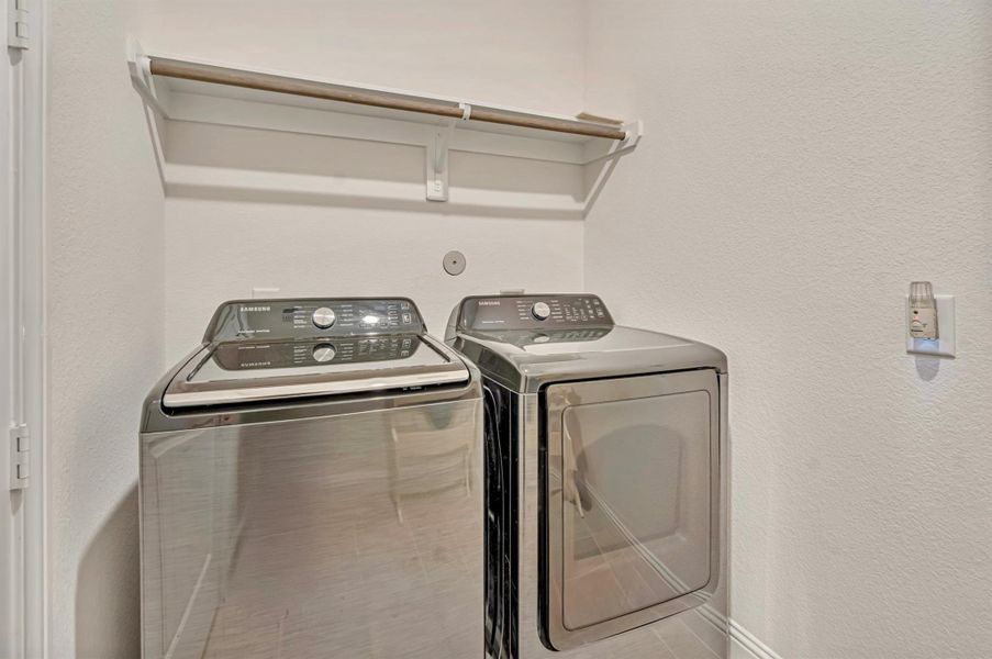 Furnished interior view inside a new home in Harper's Preserve - Classic Series, Conroe (Image 10). Furnished interior view inside a new home in Harper's Preserve - Classic Series, Conroe (Image 10).