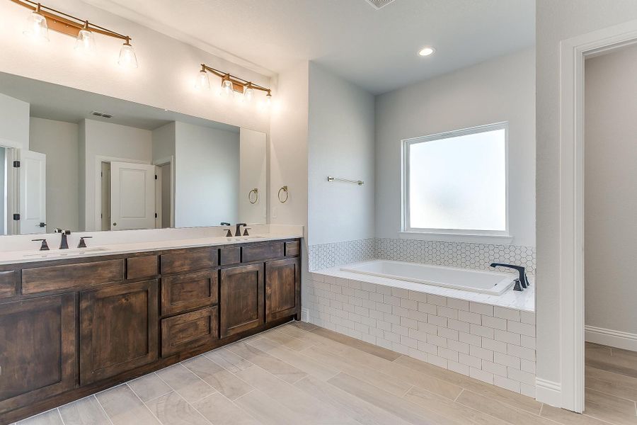Representative furnished interior of a home built from the Refuge Lane by Trinity Classic Homes in Zion Trails, Poolville (Image 31).