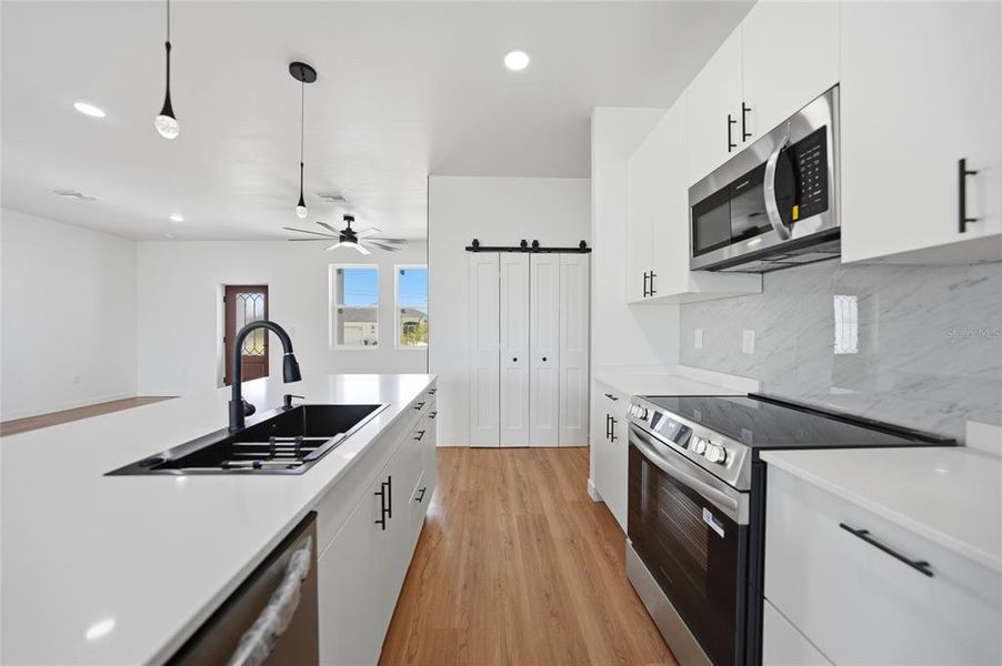 Furnished interior view inside a new home in , Port Charlotte (Image 17).