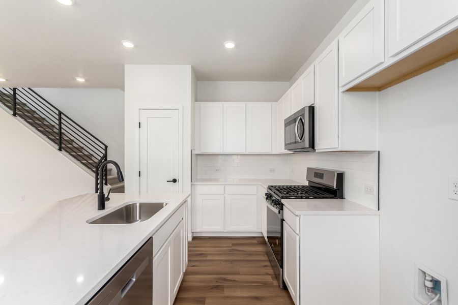 Furnished interior view inside a new home in Painted Prairie, Aurora (Image 7).