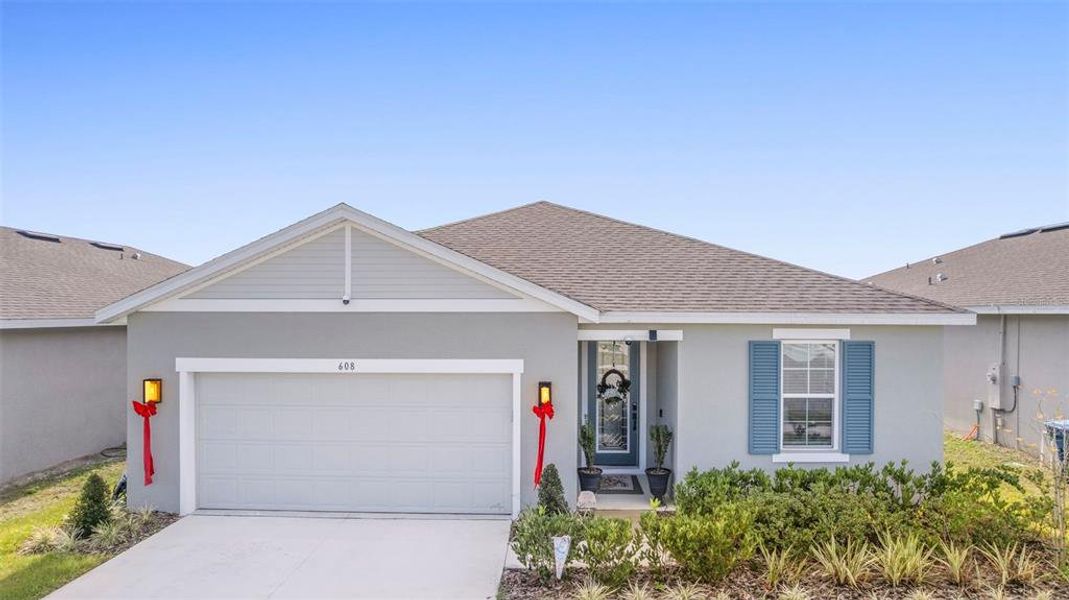 Front exterior of a new home in , Lake Wales, FL, highlighting curb appeal (Image 26). Front exterior of a new home in , Lake Wales, FL, highlighting curb appeal (Image 26).