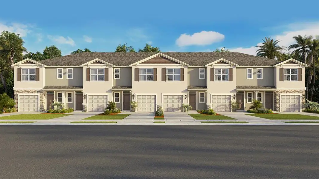 Front exterior of a new home in Woodcreek, Wesley Chapel, FL, highlighting curb appeal (Image 1).