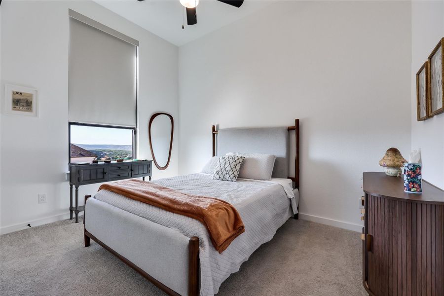 High ceilings and soft carpeting define this inviting room highlighted by a large picture window. High ceilings and soft carpeting define this inviting room highlighted by a large picture window.