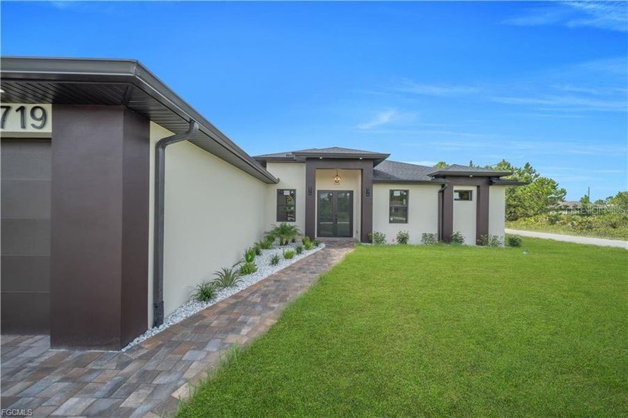 Exterior details and patio area of a home in , Lehigh Acres (Image 30).