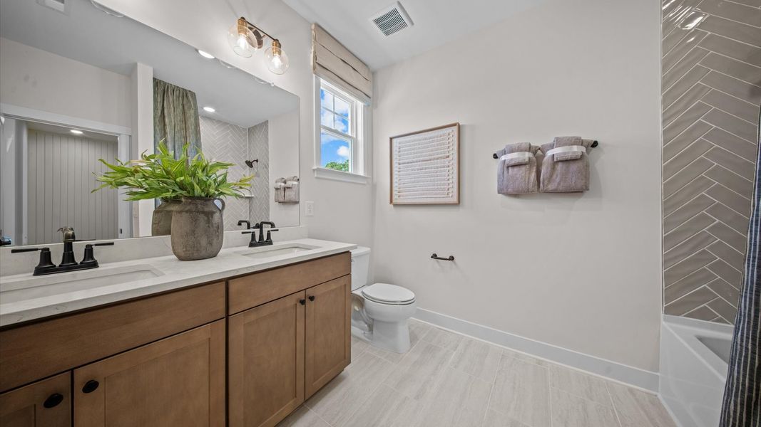 Representative furnished interior of a home built from the Harlow by DRB Homes in Bayberry, Raleigh (Image 37).
