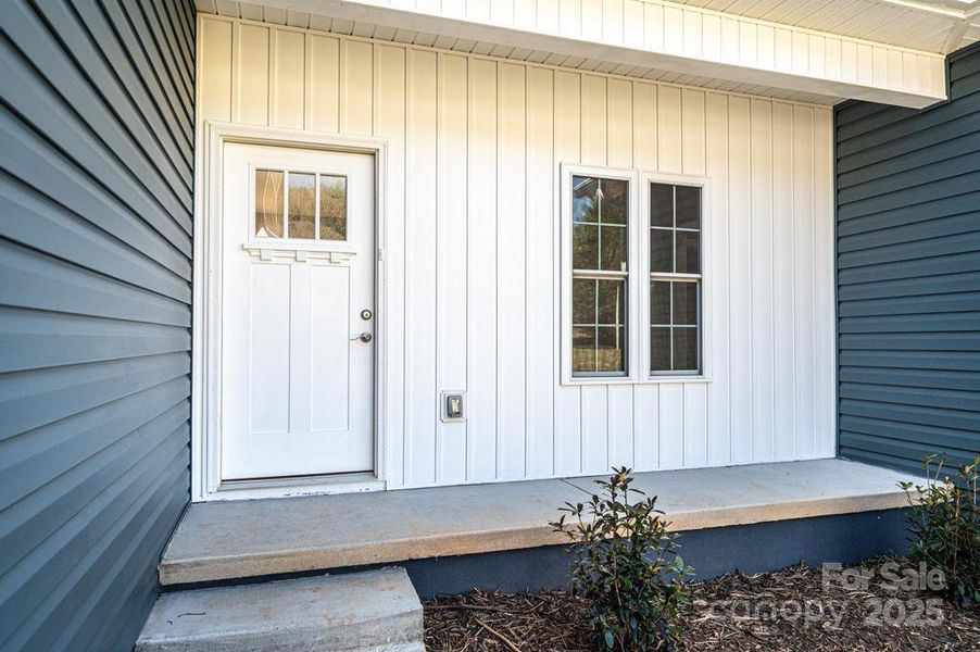 Front exterior of a new home in , Hickory, NC, highlighting curb appeal (Image 13).