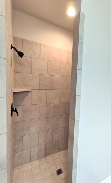 Spacious walk-in shower - no door to clean!