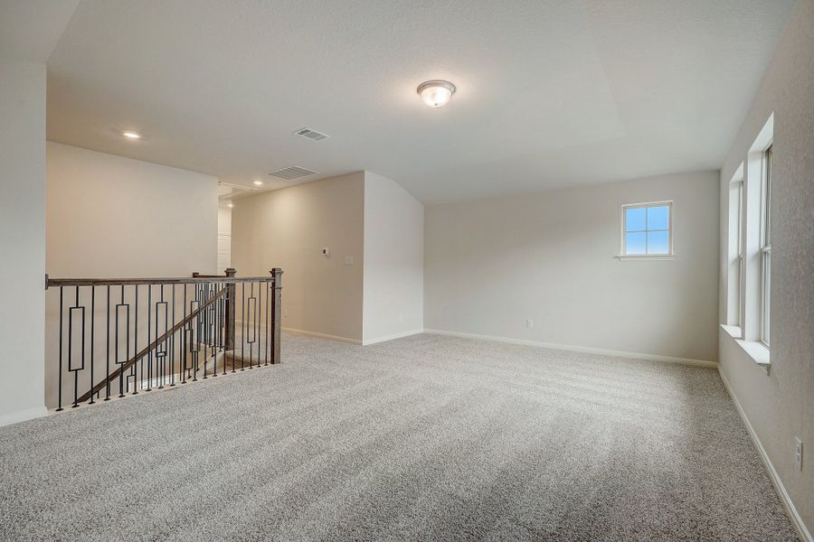 Second floor landing in the Pearl floorplan at a Meritage Homes community.