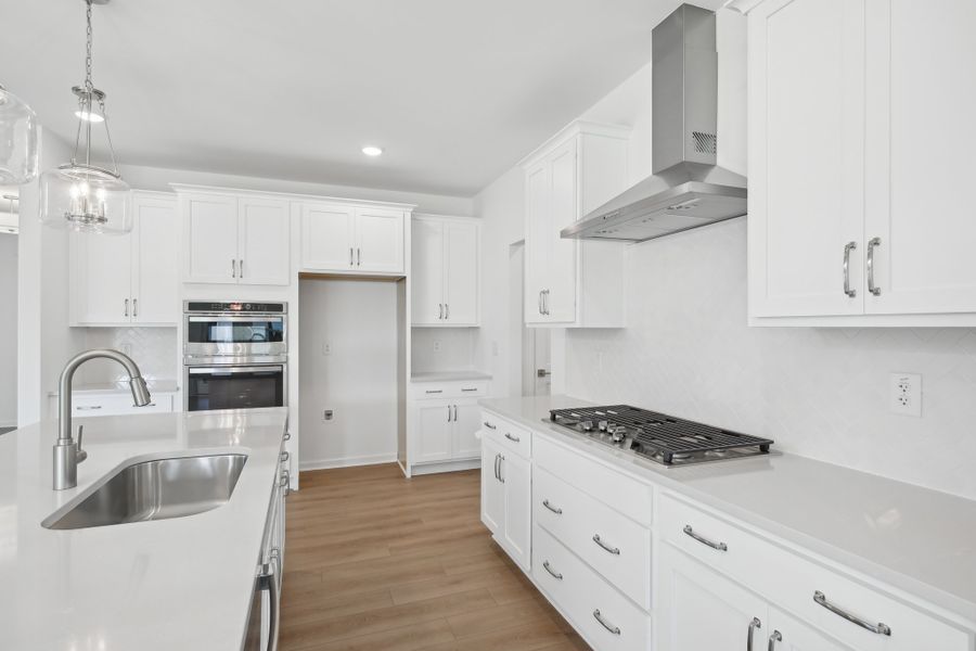 Furnished interior in a model home at Rowland's Grant in Fuquay Varina (Image 7).