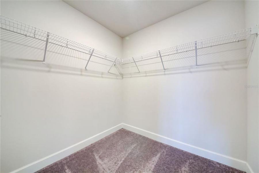 Spacious, unfurnished interior of a new home in Aviary at Rutland Ranch, Parrish (Image 15).