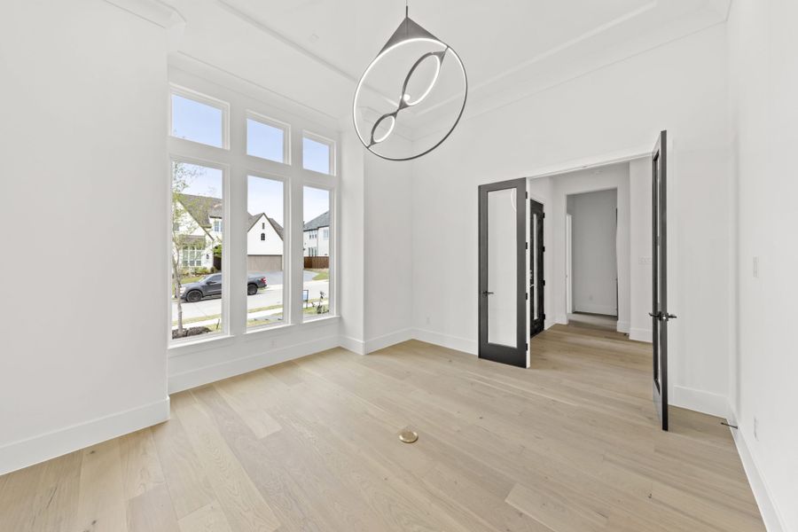 Representative unfurnished interior of a home built from the 6051 by Tradition Homes in Mustang Lakes, McKinney (Image 12).