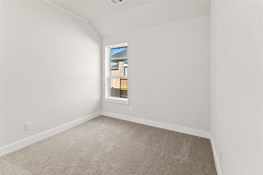 Spacious, unfurnished interior of a new home in Ellwood, Iowa Colony (Image 21).