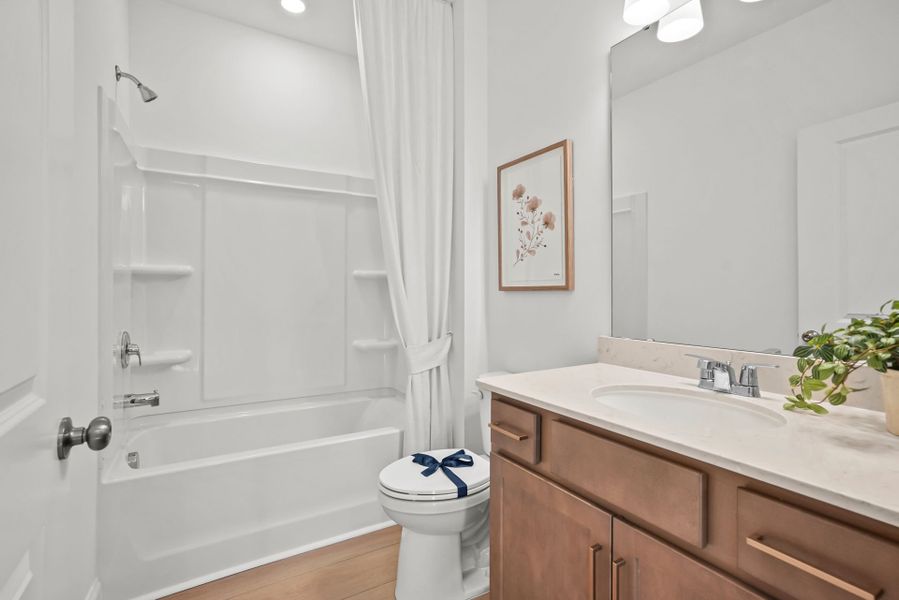 Representative furnished interior of a home built from the Compass by Del Webb in Del Webb Carolina Ridge, Midland (Image 60).
