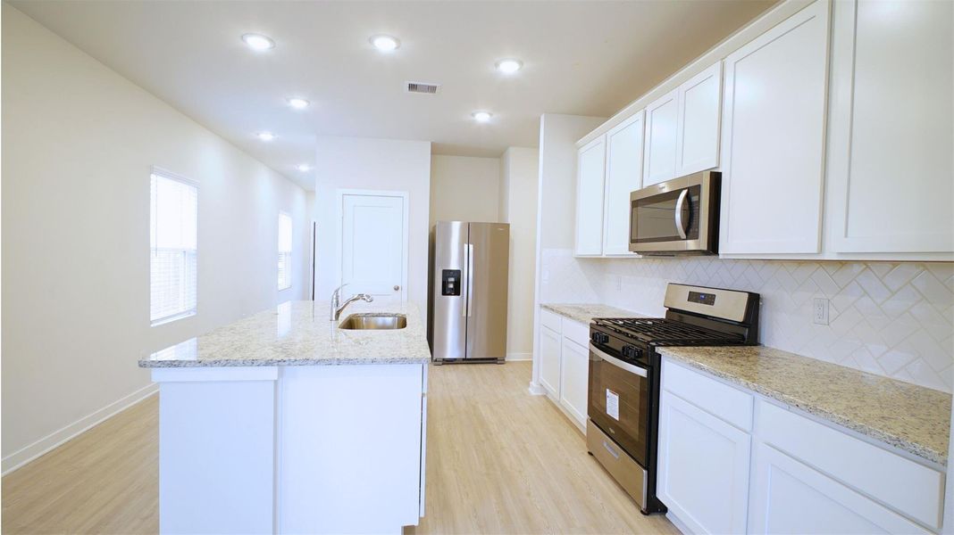 Furnished interior view inside a new home in Lonestar Collection at Aurora, Katy (Image 10).