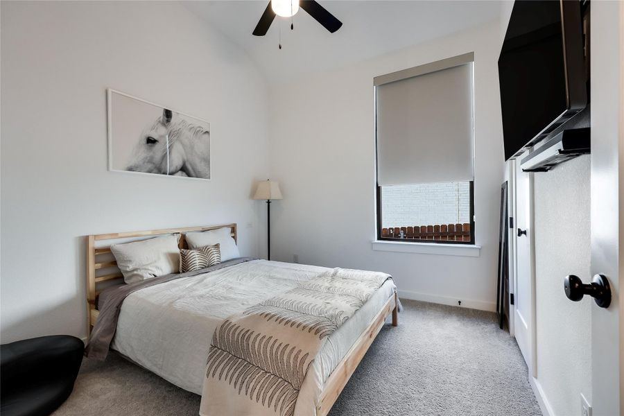 High ceilings and soft carpeting define this inviting secondary bedroom. High ceilings and soft carpeting define this inviting secondary bedroom.