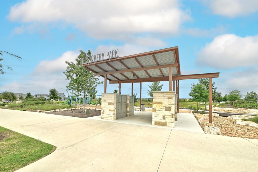 Discovery Park pavilion and mail kiosk hub connected by paved trail networks. Discovery Park pavilion and mail kiosk hub connected by paved trail networks.