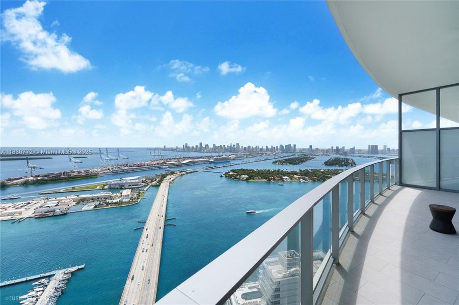 Exterior details and patio area of a home in Five Park, Miami Beach (Image 24).