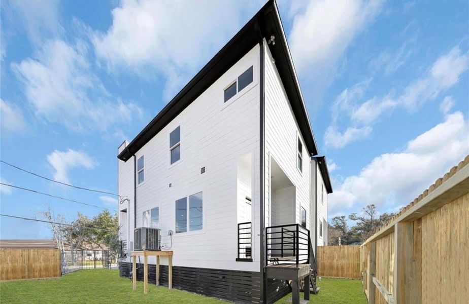 Exterior details and patio area of a home in , Houston (Image 2).