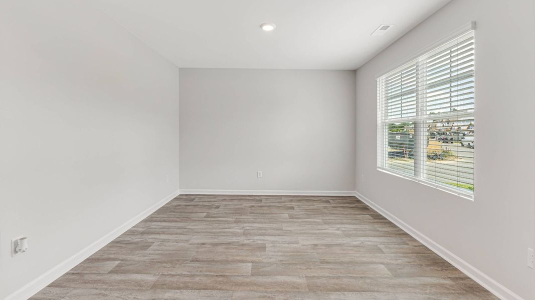 Representative unfurnished interior of a home built from the HAYDEN by D.R. Horton in Saltgrass Landing, Winnabow (Image 13).