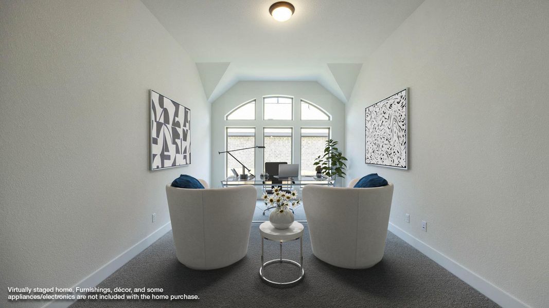 Sitting room featuring baseboards, carpet, and vaulted ceiling Sitting room featuring baseboards, carpet, and vaulted ceiling