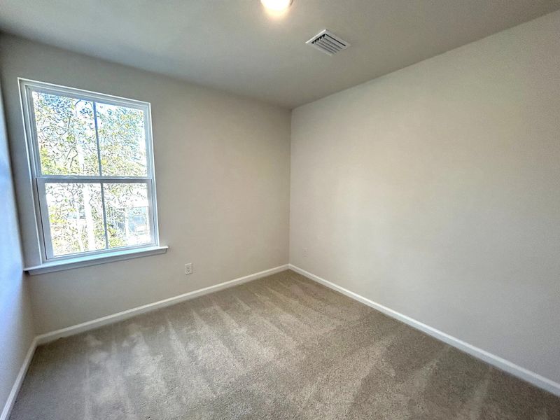 Spacious, unfurnished interior of a new home in Windward Village, Summerville (Image 11).