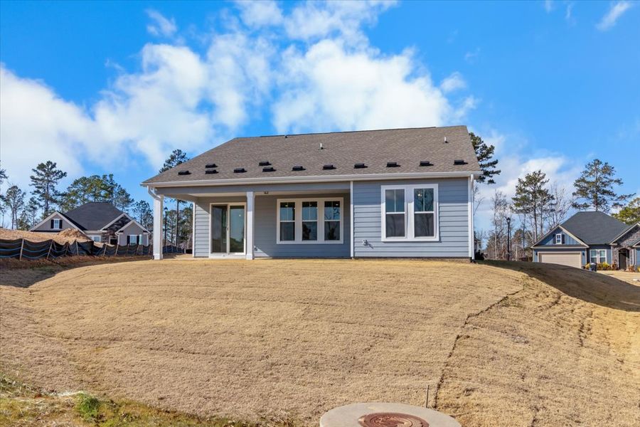 Exterior details and patio area of a home in Sinclair at Crawford Creek, Grovetown (Image 19).