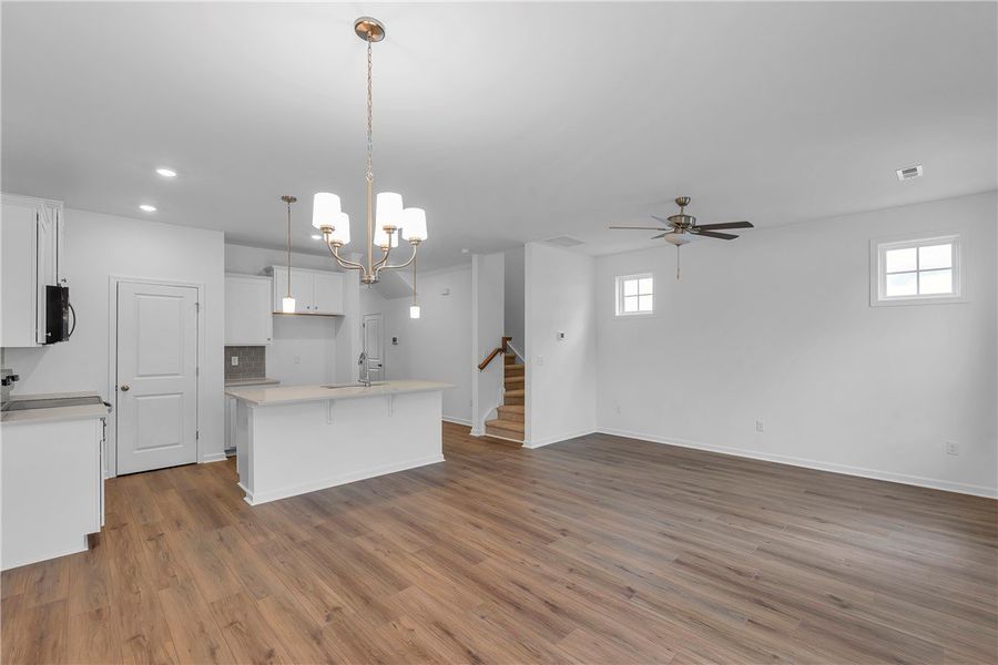 This bright, open-concept living space features wa This bright, open-concept living space features wa