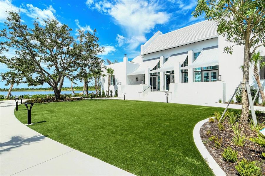 Front exterior of a new home in , Venice, FL, highlighting curb appeal (Image 21).