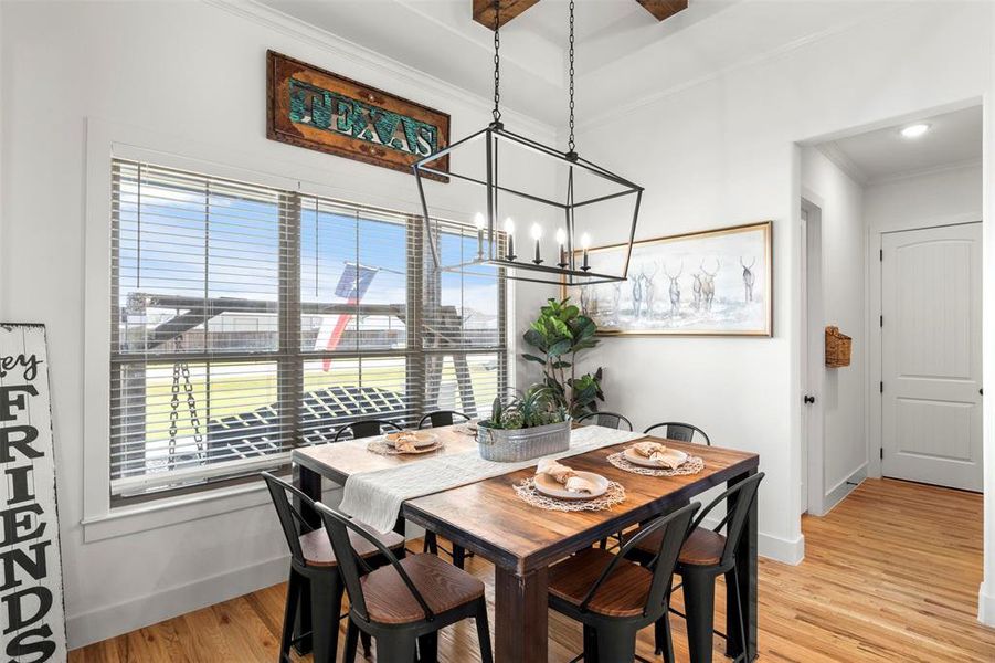 Dining space with decorative lighting