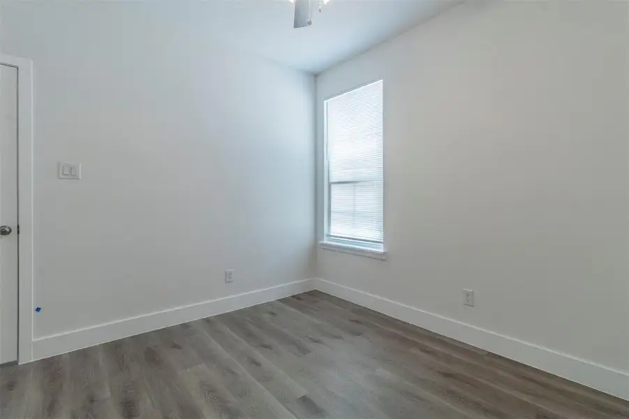 Unfurnished room with light hardwood / wood-style floors