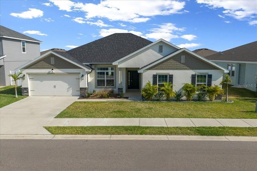 Front exterior of a new home in , Ocala, FL, highlighting curb appeal (Image 1). Front exterior of a new home in , Ocala, FL, highlighting curb appeal (Image 1).