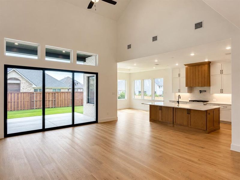 Our Cathy floor plan features an open and flowing main living level with a full wall slider creating the perfect indoor-outdoor entertaining area.