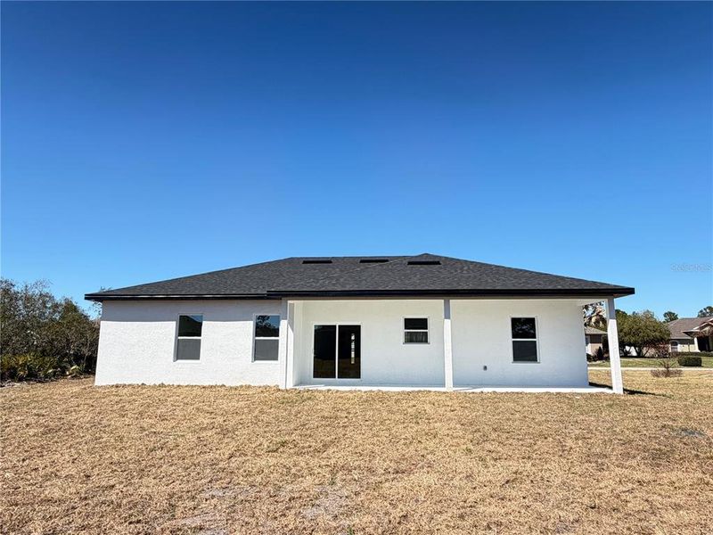 Exterior details and patio area of a home in , Sebring (Image 16).