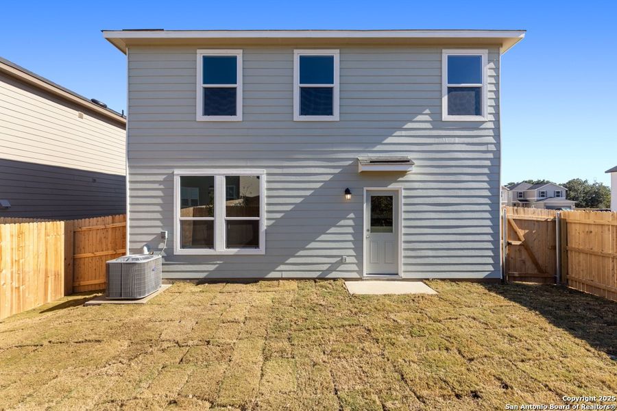 Exterior details and patio area of a home in Southton Cove, Elmendorf (Image 3).