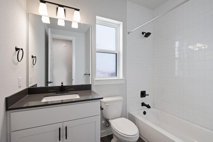 Furnished interior view inside a new home in Park Collection at Lariat, Liberty Hill (Image 4). Furnished interior view inside a new home in Park Collection at Lariat, Liberty Hill (Image 4).