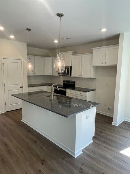 Furnished interior view inside a new home in Springwood Grove, Central (Image 6).