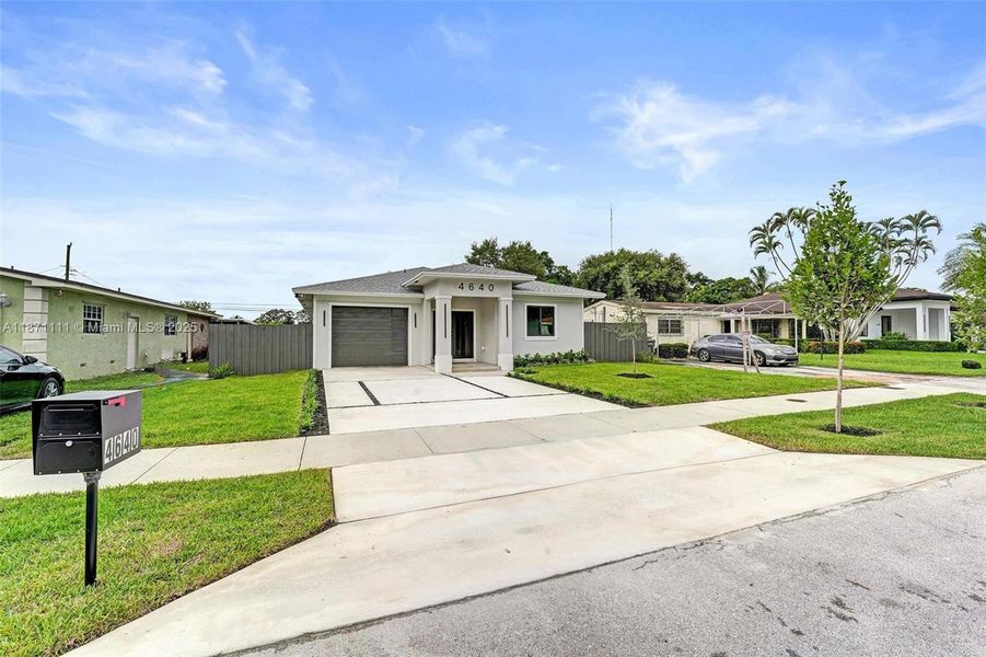 Front exterior of a new home in , West Park, FL, highlighting curb appeal (Image 34). Front exterior of a new home in , West Park, FL, highlighting curb appeal (Image 34).