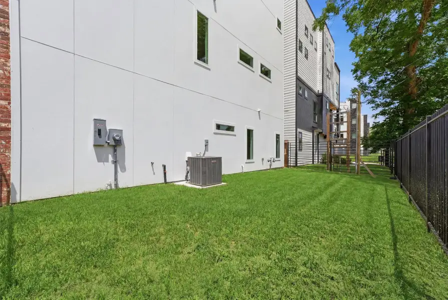 Exterior details and patio area of a home in , Houston (Image 32). Exterior details and patio area of a home in , Houston (Image 32).