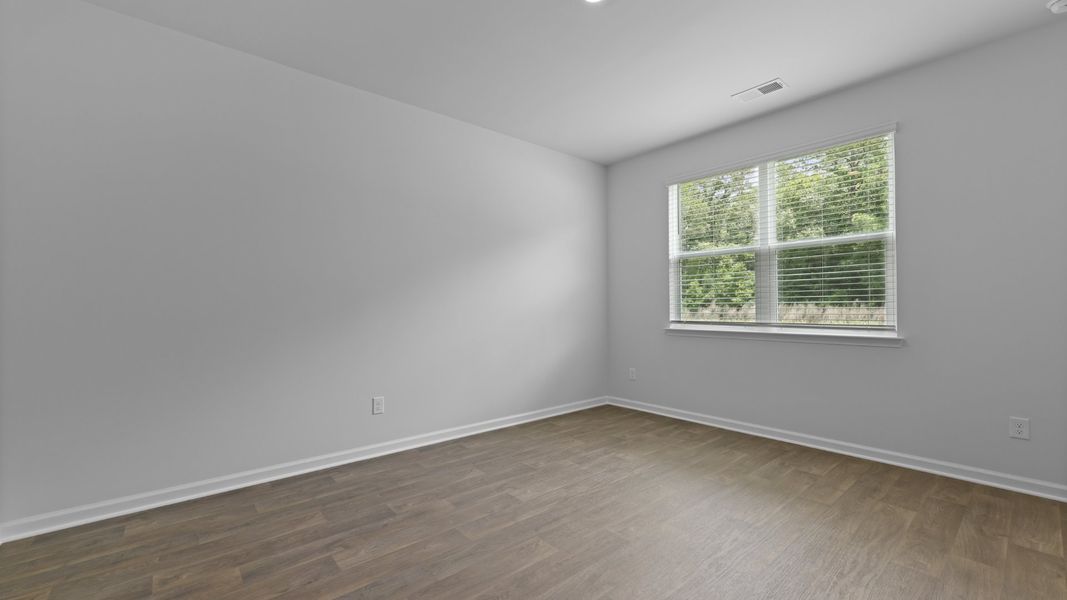 Representative unfurnished interior of a home built from the CALI by D.R. Horton in The Ranch, Holly Hill (Image 24).