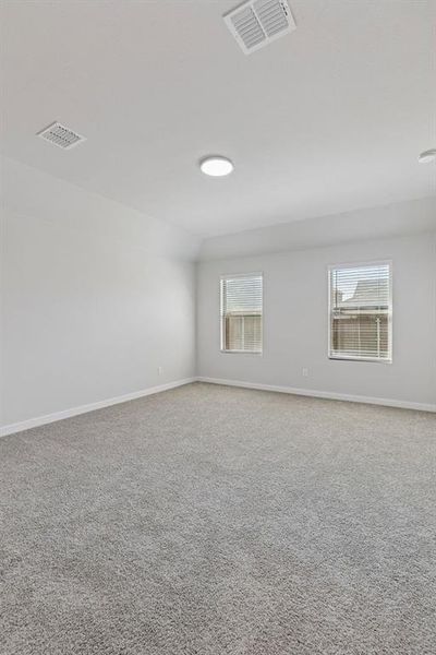 Bedroom in the Harrison home plan by Trophy Signature Homes – REPRESENTATIVE PHOTO