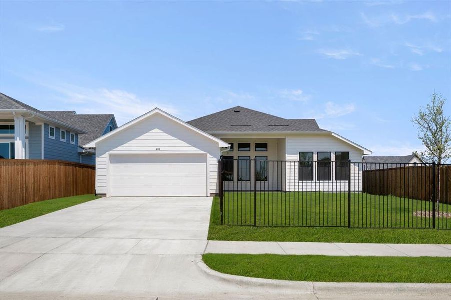 Front exterior of a new home in MidTowne, Midlothian, TX, highlighting curb appeal (Image 27). Front exterior of a new home in MidTowne, Midlothian, TX, highlighting curb appeal (Image 27).