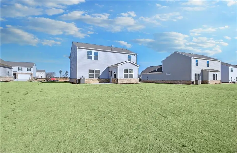 Exterior details and patio area of a home in Anderson Point, McDonough (Image 3).