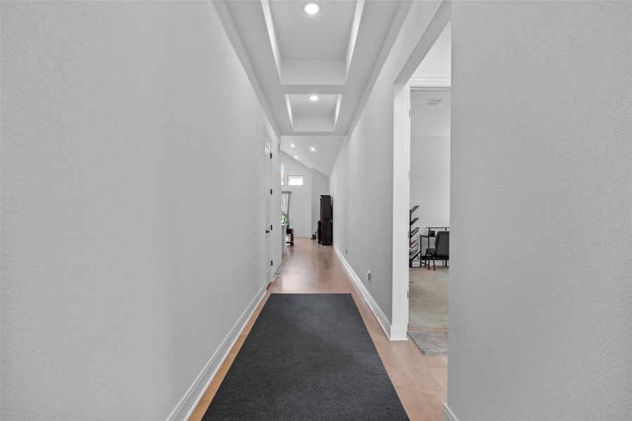 Coffered ceilings and rich hardwood flooring. Coffered ceilings and rich hardwood flooring.