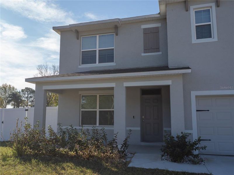Exterior details and patio area of a home in Poinciana Enclave, Kissimmee (Image 3).