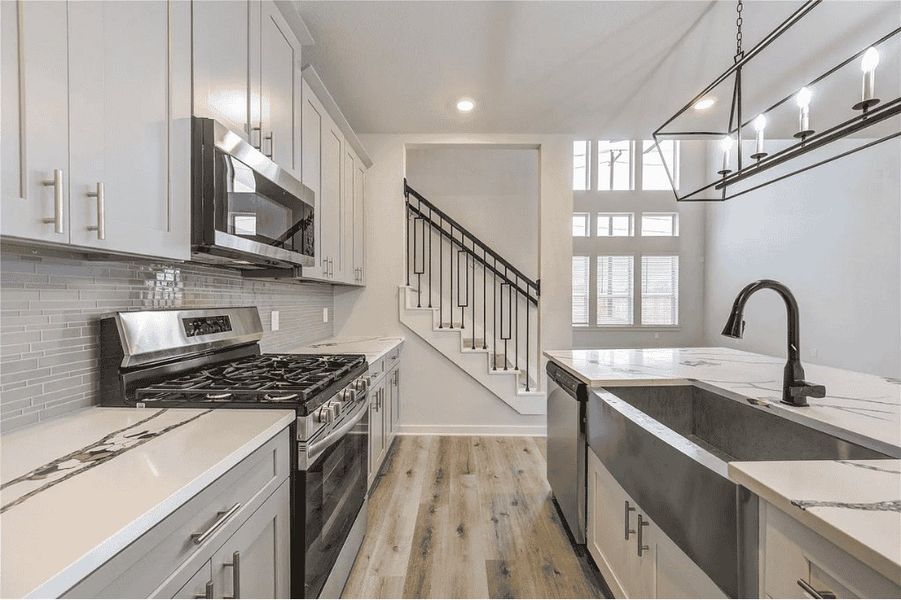 Representative furnished interior of a home built from the Christina 2516 D by Saratoga Homes in Kendall Lakes, Alvin (Image 5). Representative furnished interior of a home built from the Christina 2516 D by Saratoga Homes in Kendall Lakes, Alvin (Image 5).