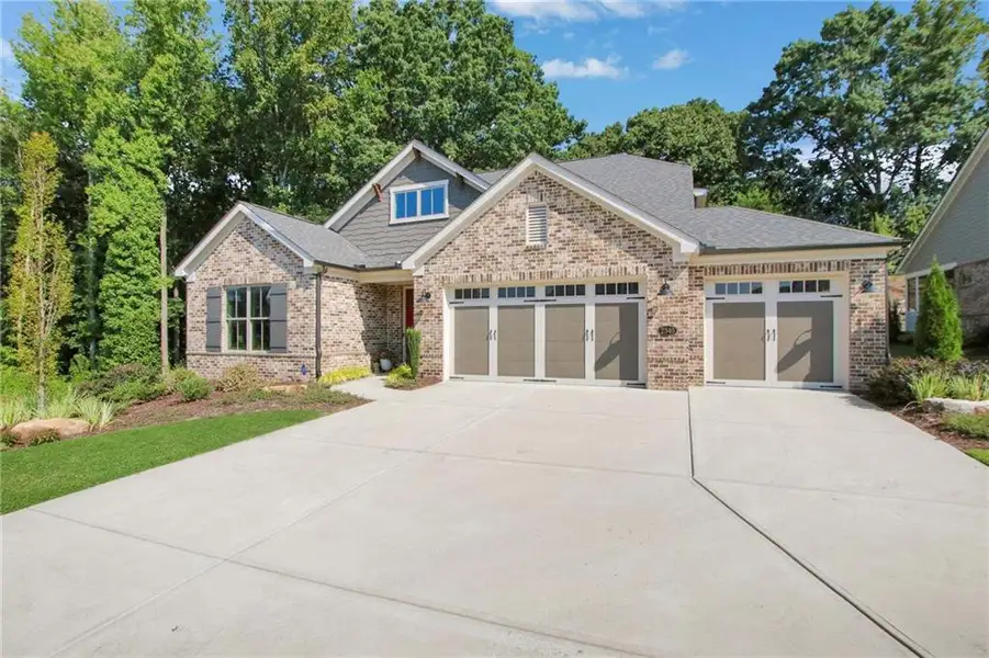 Front exterior of a new home in , Cumming, GA, highlighting curb appeal (Image 22). Front exterior of a new home in , Cumming, GA, highlighting curb appeal (Image 22).
