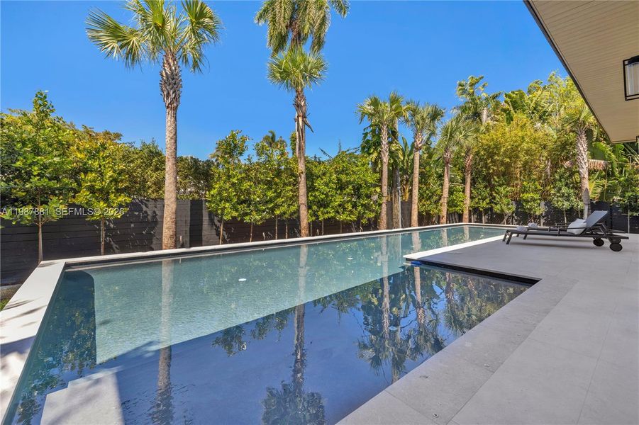 Exterior details and patio area of a home in , Miami (Image 49).